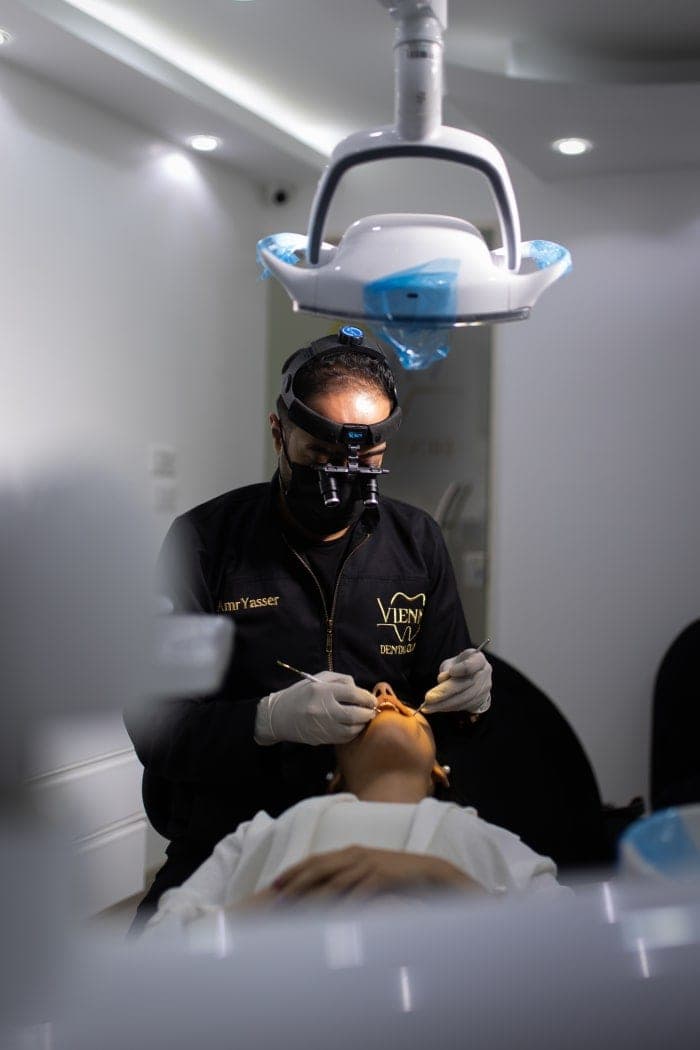 Treating a patient at Vienna Dental Clinic in Nasr City